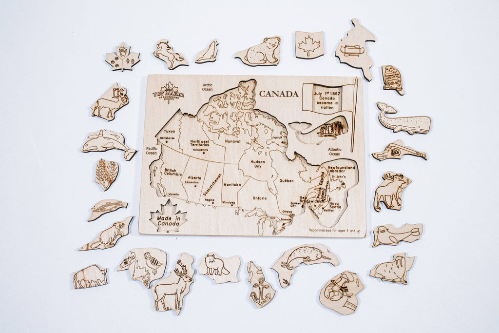 Wooden Canada map puzzle with native animal pieces