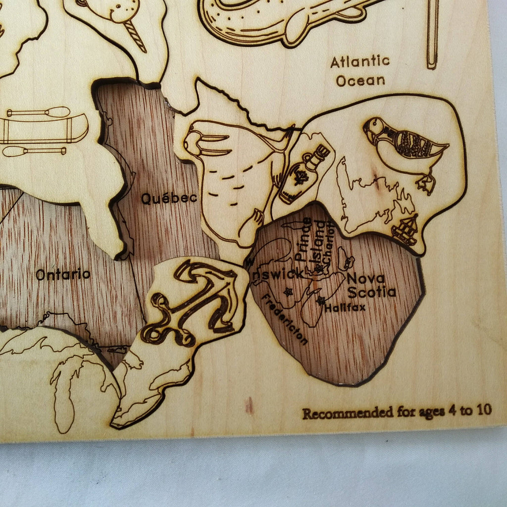 Wooden Canada map puzzle with native animal pieces, photo 4