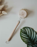 Wooden dish brush with natural bristles and a beech wood handle